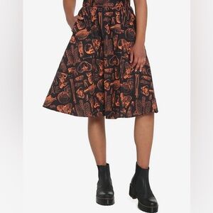 Hot topic orange black skeleton anatomy circle a line skirt Medium